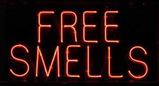 Free Smells Neon Sign